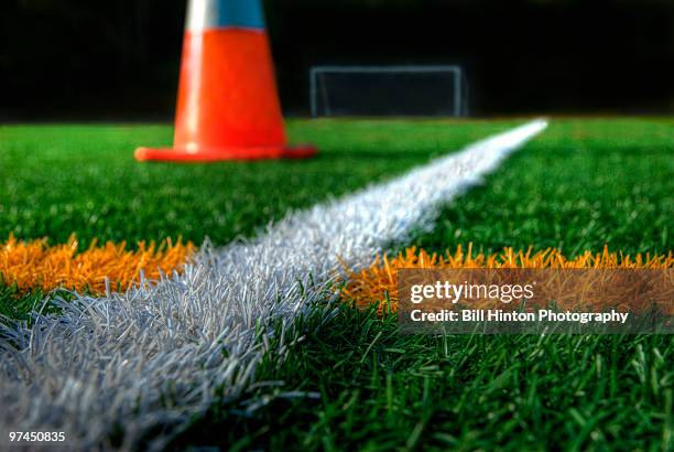 soccer field lines with cone - bill hinton stockfoto's en -beelden