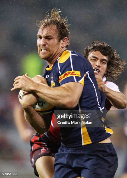 Rocky Elsom of the Brumbies runs the ball during the round four Super 14 match between the Brumbies and the Lions at Canberra Stadium on March 5,...