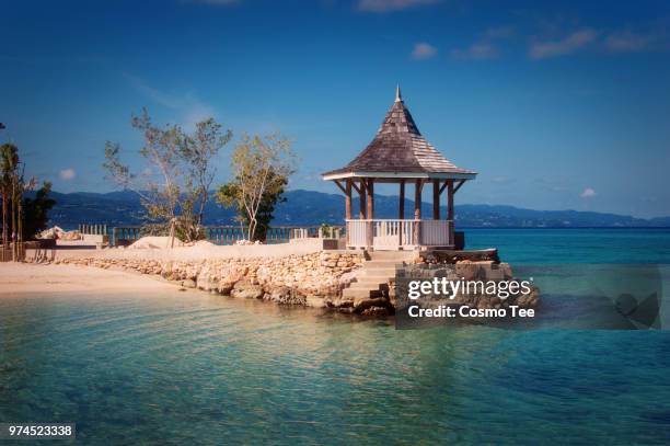 gazebo on beach in montego bay, montego bay, saint james parish, jamaica - montego bay stock-fotos und bilder