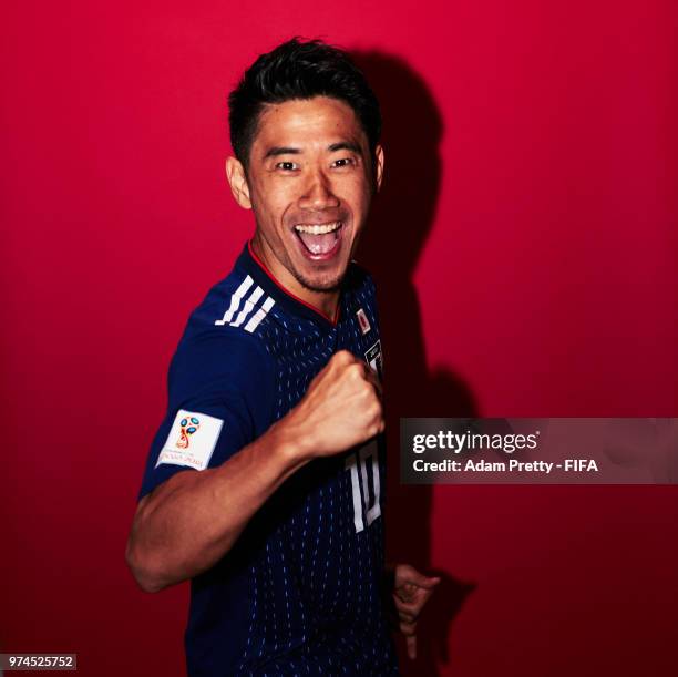 Shinji Kagawa of Japan poses for a portrait during the official FIFA World Cup 2018 portrait session at the FC Rubin Training Grounds on June 14,...