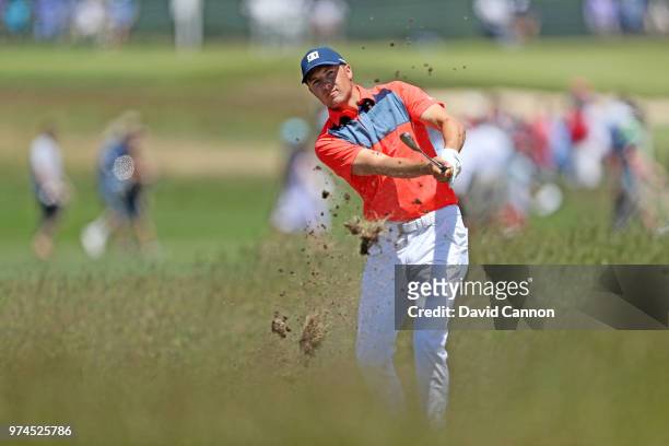 Jordan Spieth of the United States plays his second shot on the fourth hole during the first round of the 2018 US Open at Shinnecock Hills Golf Club...