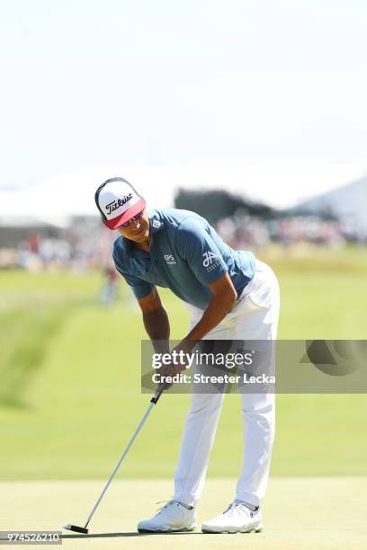 Rafa Cabrera Bello of Spain reacts to a putt on the third green during the first round of the 2018 U.S. Open at Shinnecock Hills Golf Club on June...