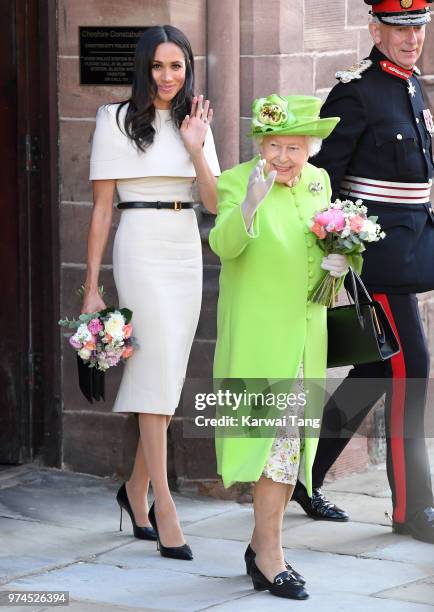 Meghan, Duchess of Sussex and Queen Elizabeth II depart Chester Town Hall, where they attended lunch as guests of Chester City Council on June 14,...