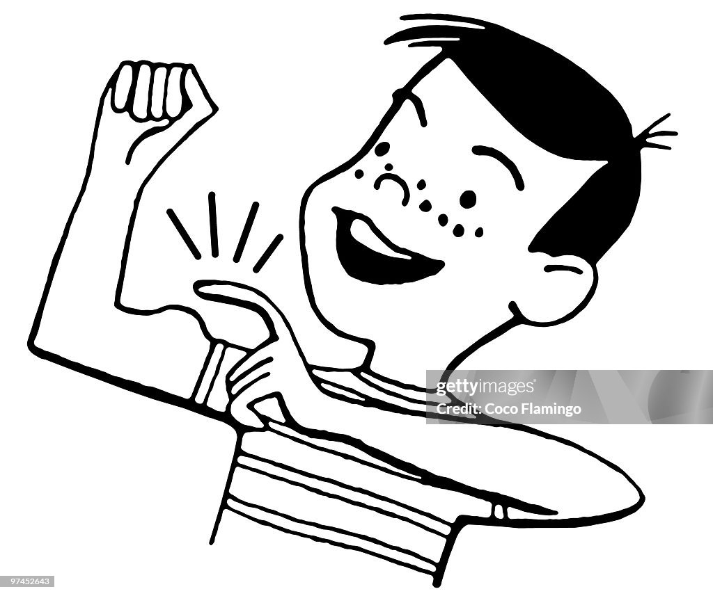 Boy flexing and tapping muscles