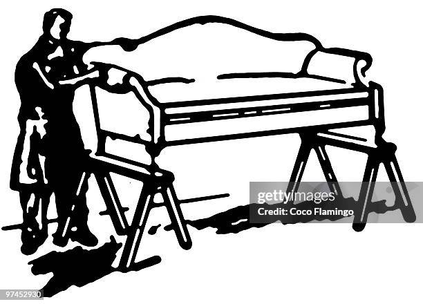 a black and white version of a vintage style image of a man fixing a sofa - reupholstering stock illustrations