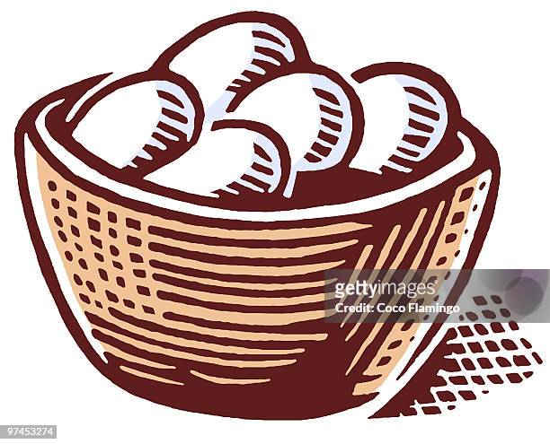 a print of a basket of eggs - coco brown stock illustrations