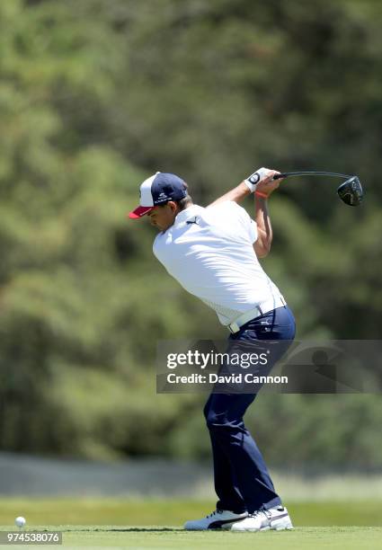 Rickie Fowler of the United States plays his tee shot on the sixth hole during the first round of the 2018 US Open at Shinnecock Hills Golf Club on...