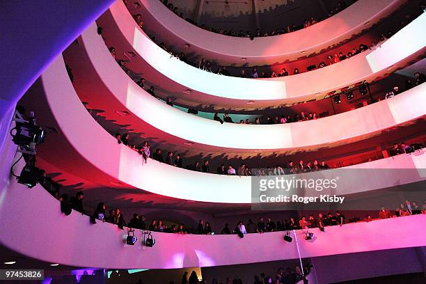 Concert goers watch the performance of Animal Collective at the Solomon R. Guggenheim Museum on March 4, 2010 in New York City.