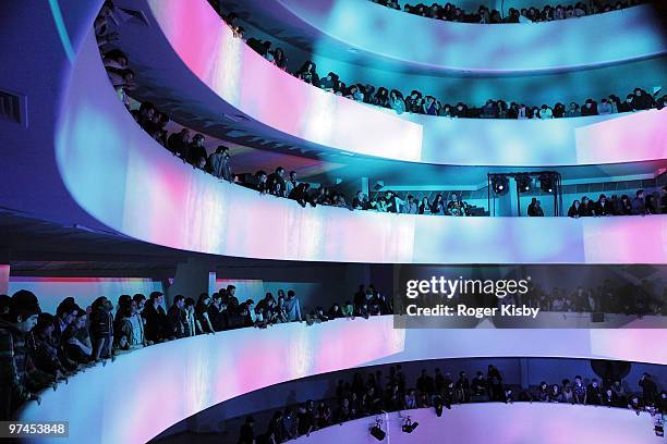 Concert goers watch the performance of Animal Collective at the Solomon R. Guggenheim Museum on March 4, 2010 in New York City.