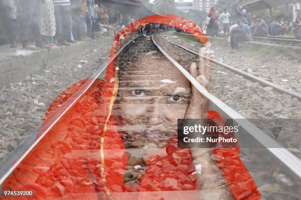 Bangladeshi people wait for trains at a railway station to go their homes to celebrate upcoming Eid-al-Fitr festival in Dhaka, Bangladesh on June 14,...