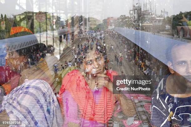 Bangladeshi people wait for trains at a railway station to go their homes to celebrate upcoming Eid-al-Fitr festival in Dhaka, Bangladesh on June 14,...