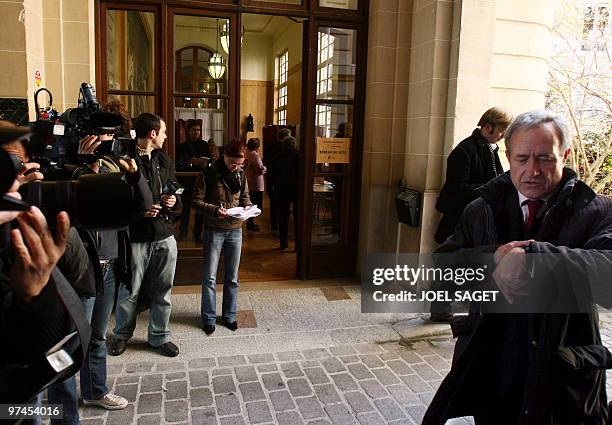 Former Paris mayor Jean Tiberi leaves a polling station after voting on March 16, 2008 in the French capital for the final round of the local...