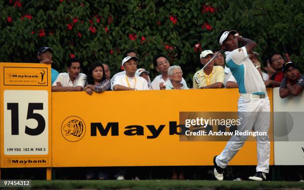 Thongchai Jaidee of Thailand hits his tee-shot on the 15th hole during the the second round of the Maybank Malaysian Open at the Kuala Lumpur Golf...