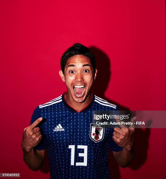 Yoshinori Muto of Japan poses for a portrait during the official FIFA World Cup 2018 portrait session at the FC Rubin Training Grounds on June 14,...