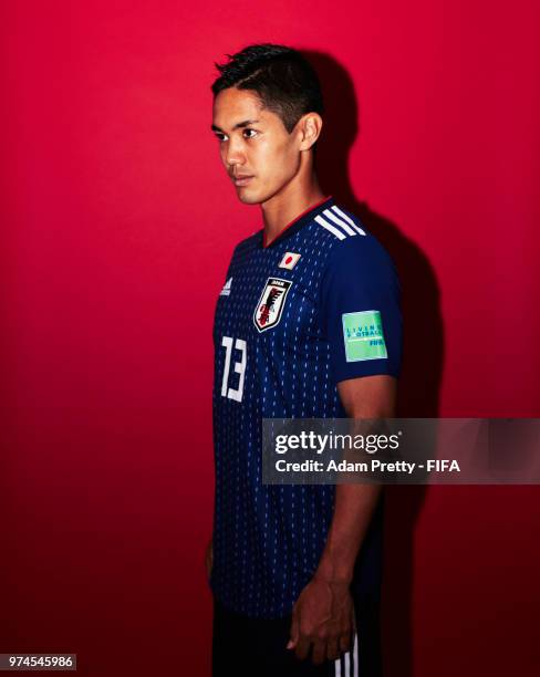 Yoshinori Muto of Japan poses for a portrait during the official FIFA World Cup 2018 portrait session at the FC Rubin Training Grounds on June 14,...