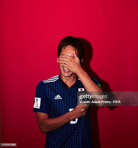 Genki Haraguchi of Japan poses for a portrait during the official FIFA World Cup 2018 portrait session at the FC Rubin Training Grounds on June 14,...