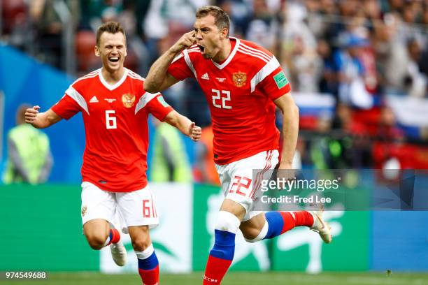 Artem Dzyuba of Russia celebrates after he scores his team's third goal during the 2018 FIFA World Cup Russia group A match between Russia and Saudi...