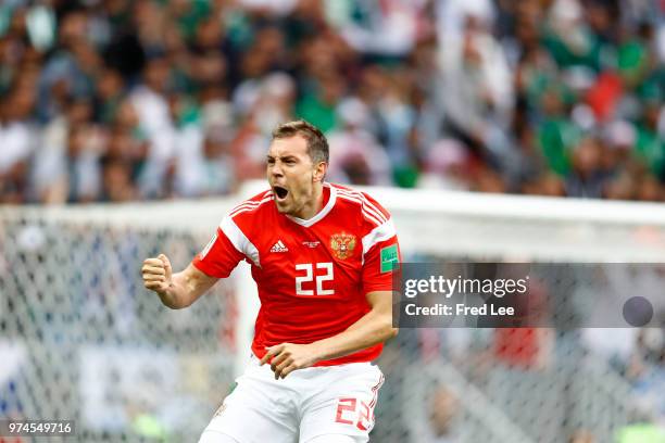 Artem Dzyuba of Russia celebrates after he scores his team's third goal during the 2018 FIFA World Cup Russia group A match between Russia and Saudi...