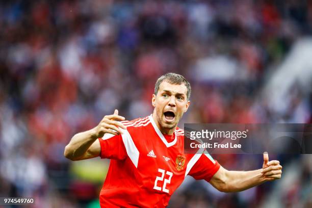 Artem Dzyuba of Russia celebrates after he scores his team's third goal during the 2018 FIFA World Cup Russia group A match between Russia and Saudi...