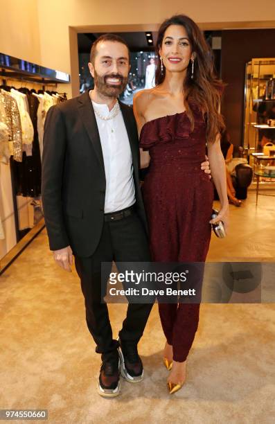 Giambattista Valli and Amal Clooney attend the Giambattista Valli London store opening on Sloane Street on June 14, 2018 in London, England.