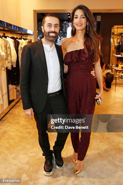 Giambattista Valli and Amal Clooney attend the Giambattista Valli London store opening on Sloane Street on June 14, 2018 in London, England.