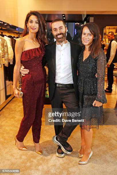 Amal Clooney, Giambattista Valli and Philippa Webb attend the Giambattista Valli London store opening on Sloane Street on June 14, 2018 in London,...