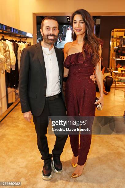 Giambattista Valli and Amal Clooney attend the Giambattista Valli London store opening on Sloane Street on June 14, 2018 in London, England.