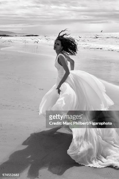 Model Elena Melnik poses at a fashion shoot for Madame Figaro on November 28, 2017 in Taghazout, Morocco. Dress by Atelier Pronovias. Ring by De...