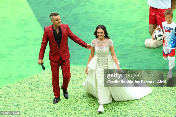 Robbie Wiliams and Aida Garifullina perform at the opening ceremony prior to the 2018 FIFA World Cup Russia group A match between Russia and Saudi...