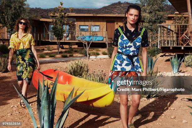 Models Elena Melnik and Alexandra Martynova pose at a fashion shoot for Madame Figaro on November 29, 2017 in Taghazout, Morocco. Alexandra: shirt...