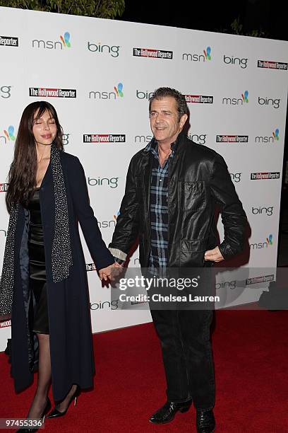 Actor Mel Gibson and fiance Oksana Grigorieva arrive at The Hollywood Reporter Reception Honoring Oscar Nominees at The Getty House on March 4, 2010...
