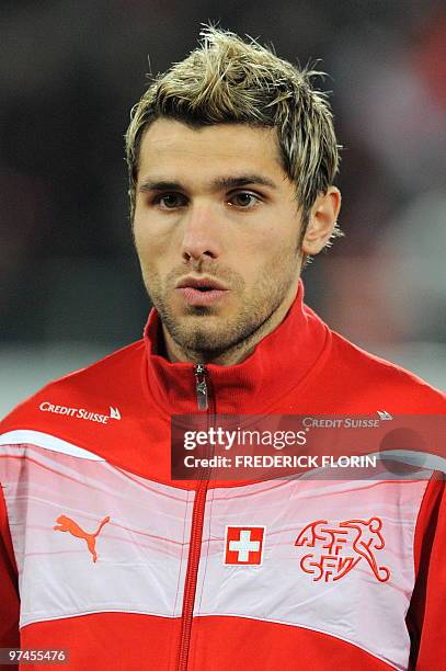 Switzerland's Valon Behrami listens to the national anthems ahead of the World Cup 2010 friendly football match Switzerland vs Uruguay at AFG Arena...