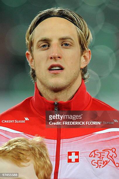 Switzerland's Reto Ziegler listens to the national anthems ahead of the World Cup 2010 friendly football match Switzerland vs Uruguay at AFG Arena...