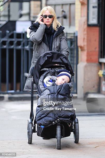 Actress Naomi Watts walks with her son Alexander Pete Schreiber in Noho on March 04, 2010 in New York City.