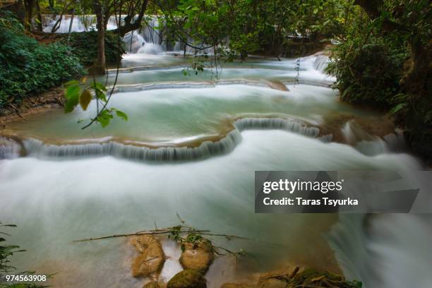 waterfall steps in forest, kuang si falls, luang prabang, laos - kuang si falls stock pictures, royalty-free photos & images