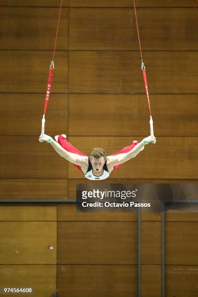 Nils Dunkel of Germany competes on the men's rings during the Artistic Gymnastics World Challenge Cup on June 14, 2018 in Guimaraes, Portugal.