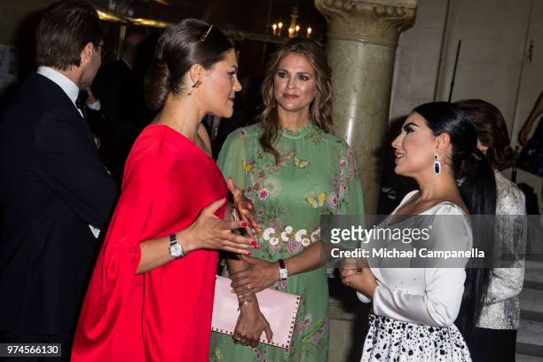 Crown Princess Victoria of Sweden and Princess Madeleine of Sweden speak with Aryana Sayeed the 2018 Polar Music Prize award ceremony at the Grand...