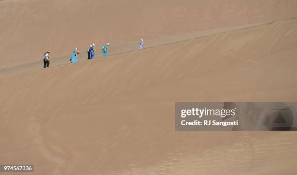 An Amish family from Ohio visit the Great Sand Dunes National Park on June 11, 2018 near Alamosa, Colorado.