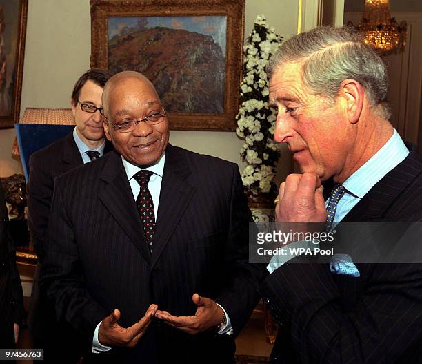 Britain's Prince Charles, Prince of Wales talks with South African President Jacob Zuma as he arrives at Clarence House where a business-focused...