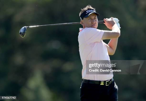 Ian Poulter of England plays his tee shot on the sixth hole during the first round of the 2018 US Open at Shinnecock Hills Golf Club on June 14, 2018...