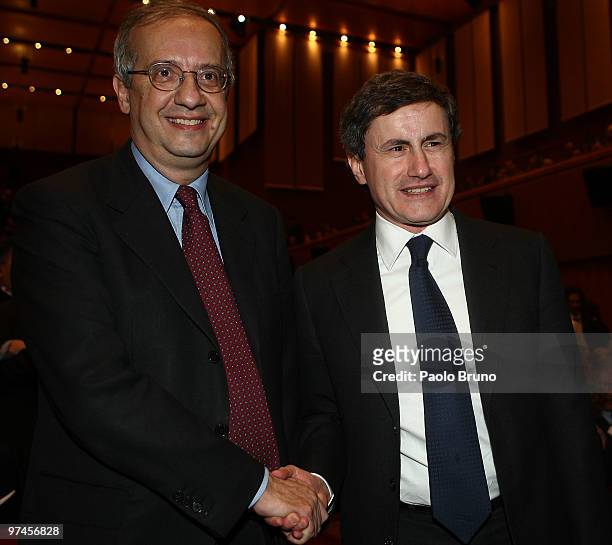 Gianni Alemanno , the mayor of Rome, shakes the hand to Walter Veltroni during the presentation of the candidature for Rome 2020 Summer Olympic Games...
