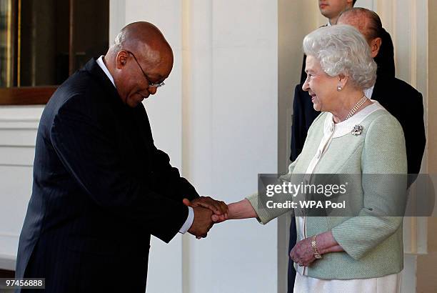 Britain's Queen Elizabeth II and Prince Philip, Duke of Edinburgh bid farewell to South Africa's President Jacob Zuma on the last day of his state...