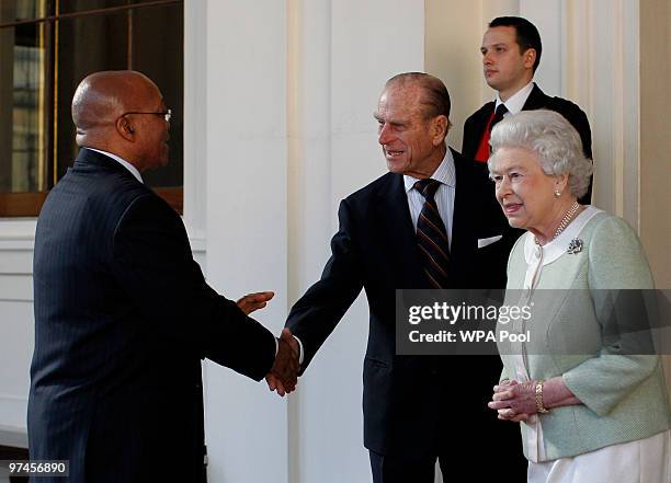 Britain's Queen Elizabeth II and Prince Philip, Duke of Edinburgh bid farewell to South Africa's President Jacob Zuma on the last day of his state...