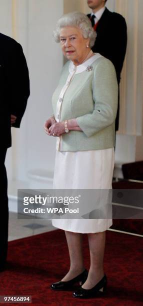 Britain's Queen Elizabeth II bids farewell to South Africa's President Jacob Zuma on the last day of his state visit to the UK at Buckingham Palace...
