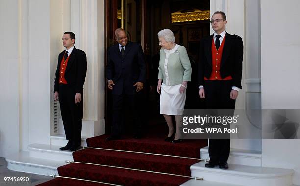 Britain's Queen Elizabeth II, center right, bids farewell to South Africa's President Jacob Zuma, center left, on the last day of his state visit to...
