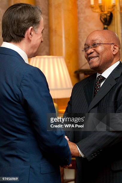 South African President Jacob Zuma meets British Business Secretary Peter Mandelson before a business breakfast at Buckingham Palace on March 5, 2010...