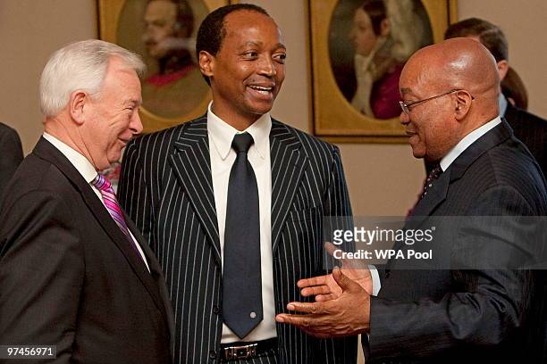 South African President Jacob Zuma talks with Sir John Parker, Chairman of mining group Anglo-American during a business breakfast at Buckingham...