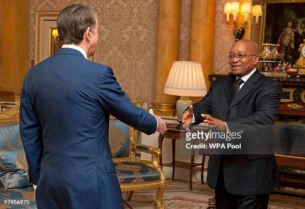 South African President Jacob Zuma meets British Business Secretary Peter Mandelson before a business breakfast at Buckingham Palace on March 5, 2010...