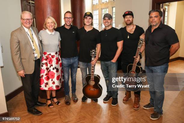 Stuart Dill, Elizabeth Roff, Tommy Moore, Ross Copperman, Jon Nite, Kip Moore and Shawn McSpadden attend the ACM Lifting Lives Music Camp Songwriting...