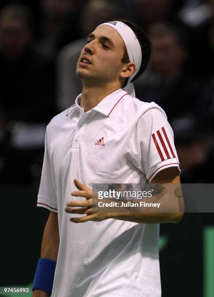 Frustrated Dan Evans of Great Britain looks on in his match against Ricardas Berankis of Lithuania during day one of the Davis Cup Tennis match...